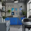 An office space with blue cabinets, artwork on the wall, and a desk in the foreground. Voir les images du produit