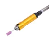 A close-up shot of a rotary tool with a grinding bit attached, isolated on a white background. Podgląd zdjęcia produktu