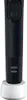 A black Oral-B electric toothbrush with a power button on a white charging base. Anteprima dell’immagine prodotto