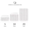 Three stacks of folded towels are shown, representing different set quantities. Anteprima dell’immagine prodotto
