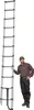 A man stands next to a tall, extended ladder. Náhľad obrázku produktu