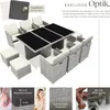 A rattan outdoor furniture set with a table and chairs, presented with marketing text and close-up feature highlights. Produktbild-Vorschau
