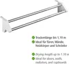 A white and silver towel rack with text describing its features. Náhled obrázku produktu