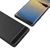 A black phone case is shown next to a smartphone. Produktbild-Vorschau