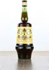 A bottle of Amaro Montenegro liquor is displayed on a wooden surface against a white background. Produktbild-Vorschau