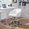 A white office chair is shown in a home office setting. Produktbild-Vorschau