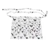 A white apron with a black and white chicken pattern and ties. Náhled obrázku produktu