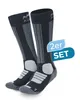 A pair of dark gray and light gray ski socks are shown against a white background. Produktbild-Vorschau
