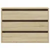 A front view of a three-drawer chest of drawers made of wood-look material. Anteprima dell’immagine prodotto