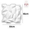 A white 3D wall panel with geometric facets, shown with dimensions and a logo. Produktbild-Vorschau