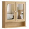 A wooden bathroom cabinet with mirrored doors and an open shelf below, shown against a white background. Produktbild-Vorschau