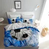 A bedroom scene with a bed made up with soccer-themed bedding. Produktbild-Vorschau