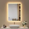 A bathroom vanity with a sink and a lit mirror. Produktbild-Vorschau