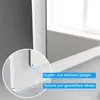 A close-up view of the corner of a mirror, highlighting its frame and edge. Náhled obrázku produktu