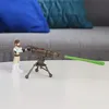 A Star Wars action figure of Obi-Wan Kenobi is shown with a weapon on a tripod, firing a green projectile. Produktbild-Vorschau