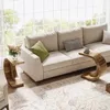 A living room scene with a sofa, accent pillows, and two C-shaped side tables. Anteprima dell’immagine prodotto