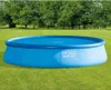 An inflatable pool is set up on a grassy lawn with trees in the background. Náhľad obrázku produktu