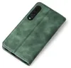 A green flip case for a smartphone is shown against a white background. Produktbild-Vorschau
