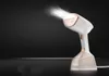 A handheld garment steamer emitting steam against a dark background. Produktbild-Vorschau