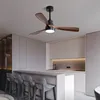 A modern kitchen and dining area with a ceiling fan and a breakfast bar. Produktbild-Vorschau