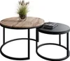 Two nesting round coffee tables with different finishes and black metal legs. Náhled obrázku produktu