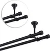 A double curtain rod system mounted from the ceiling. Anteprima dell’immagine prodotto