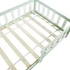 Close-up view of the slatted base and side rails of a bed frame. Anteprima dell’immagine prodotto