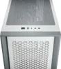 A close-up, top-down view of the front and top of a white computer case. Voir les images du produit
