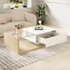 A modern living room with a couch and a coffee table. Voir les images du produit
