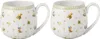 Two white ceramic mugs with a decorative pattern of bunnies and clovers. Voir les images du produit