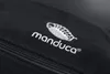 A close-up of a black fabric with a white embroidered logo and text. Produktbild-Vorschau