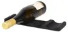 A black wine bottle holder with a bottle of white wine on a white background. Produktbild-Vorschau