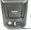 Close-up of the control panel of a black toaster. Voir les images du produit