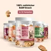 Several jars of dog treats are displayed, with promotional text above. Produktbild-Vorschau
