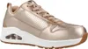 A single rose gold sneaker is shown from the side against a white background. Voir les images du produit