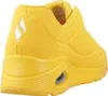 A close-up side view of a yellow Skechers sneaker. Podgląd zdjęcia produktu