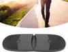 A person walking on a path with a product shown below. Voir les images du produit