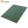 A green tarp is laid out on a white background. Podgląd zdjęcia produktu