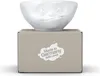 A white ceramic bowl with a face design sits on top of its packaging box. Anteprima dell’immagine prodotto