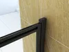 A close-up view of a black shower enclosure frame attached to a tan tiled wall. Produktbild-Vorschau