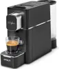 A black Polti Coffea S15B capsule coffee machine with a glass cup of espresso on its drip tray. Náhľad obrázku produktu