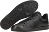 A pair of black leather sneakers with their soles displayed separately. Voir les images du produit