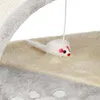 A close-up view of a cat toy mouse hanging from a string above a plush surface. Anteprima dell’immagine prodotto