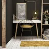 A modern home office setup with a white desk, gold chair, and decorative items. Podgląd zdjęcia produktu