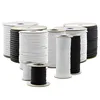 Several spools of rope or cord in black and white are arranged in a studio setting against a white background. Produktbild-Vorschau