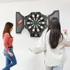 Two women playing darts in a room. Náhľad obrázku produktu