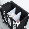 A three-compartment laundry hamper with text labels. Náhled obrázku produktu