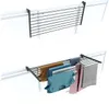 A product image showing a clothes drying rack mounted on a railing, both empty and with clothes on it. Voir les images du produit