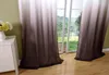 A room with a large window, showing curtains and a dresser with flowers. Produktbild-Vorschau