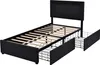 A black upholstered twin bed frame with a headboard and two pull-out drawers underneath, shown against a white background. Produktbild-Vorschau